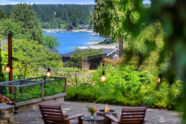 5940 Rose Loop NE, Bainbridge Island, WA 98110 - water view featuring a fire pit and a heavily wooded area