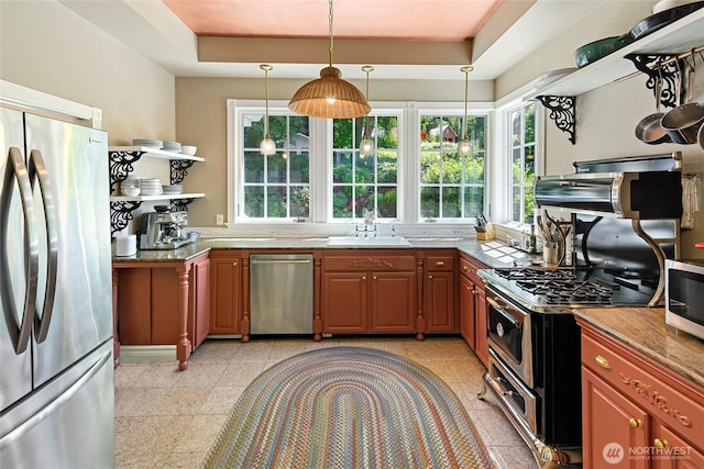 5940 Rose Loop NE, Bainbridge Island, WA 98110 - kitchen featuring appliances with stainless steel finishes, open shelves, plenty of natural light, and decorative light fixtures