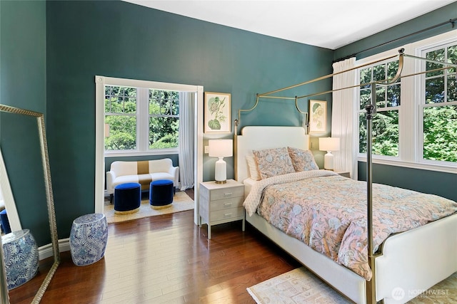 5940 Rose Loop NE, Bainbridge Island, WA 98110 - bedroom featuring dark wood-style flooring and multiple windows