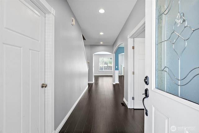 1208 Goldfinch Ave SW, Orting, WA 98360 - foyer with arched walkways, dark wood-style flooring, and recessed lighting