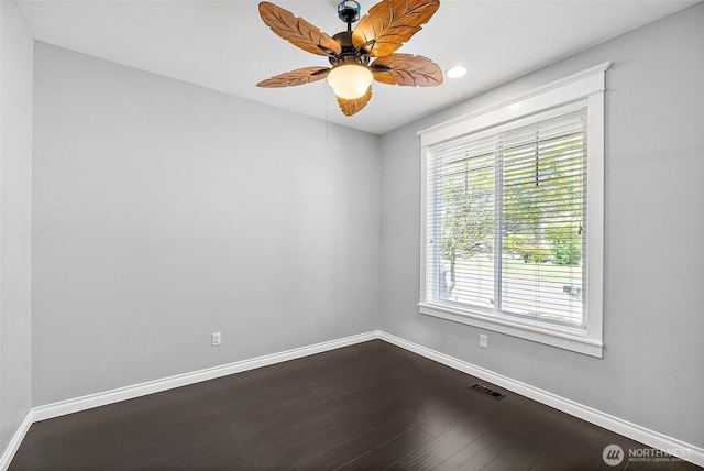 1208 Goldfinch Ave SW, Orting, WA 98360 - spare room with ceiling fan, dark wood-style floors, and recessed lighting