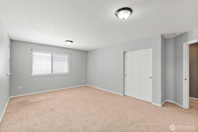 1208 Goldfinch Ave SW, Orting, WA 98360 - unfurnished bedroom with carpet and a closet