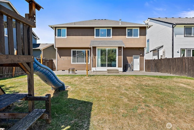 1208 Goldfinch Ave SW, Orting, WA 98360 - back of property with a patio and a fenced backyard