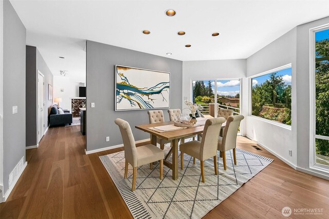 11115 NE 95th St, Kirkland, WA 98033 - dining space with wood finished floors, recessed lighting, and baseboards