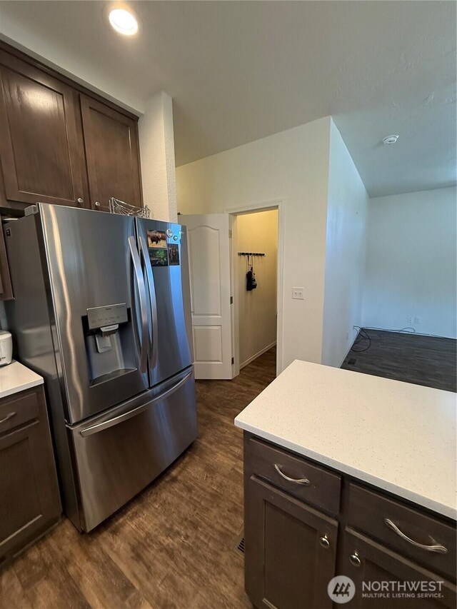 2101 S 324th St Unit 107, Federal Way, WA 98003 - kitchen featuring stainless steel refrigerator with ice dispenser, dark brown cabinets, dark wood-type flooring, light countertops, and recessed lighting