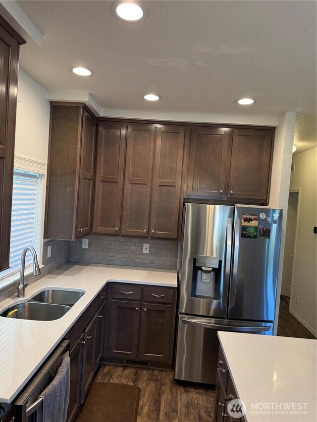 2101 S 324th St Unit 107, Federal Way, WA 98003 - kitchen with appliances with stainless steel finishes, a sink, dark brown cabinets, dark wood-style flooring, and recessed lighting