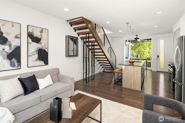 252 E Roanoke St, Seattle, WA 98102 - living room with stairway, dark wood finished floors, a ceiling fan, and recessed lighting