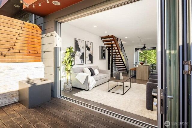 252 E Roanoke St, Seattle, WA 98102 - living room featuring dark wood-style floors, stairway, and recessed lighting