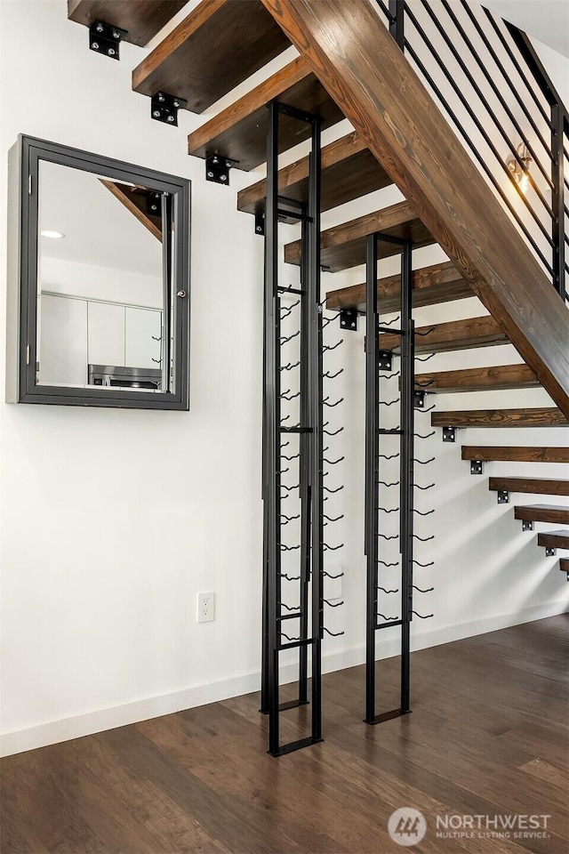 252 E Roanoke St, Seattle, WA 98102 - wine area featuring baseboards and dark wood finished floors