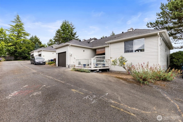 9757 Spinnaker Blvd NW, Silverdale, WA 98383 - ranch-style home with a garage
