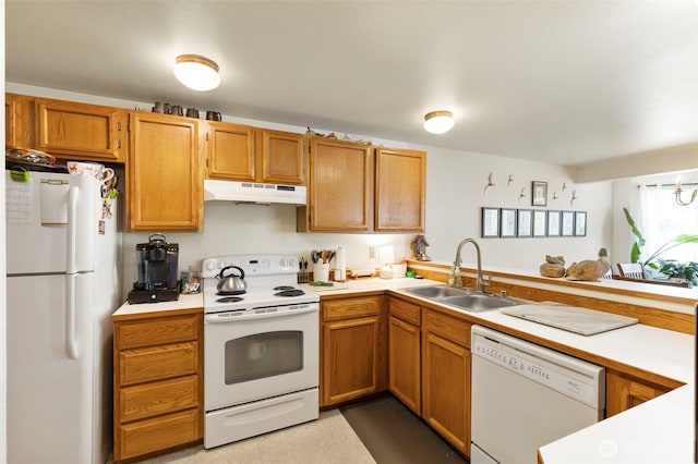 9695 Spinnaker Blvd NW, Silverdale, WA 98383 - kitchen with white appliances, under cabinet range hood, and light countertops