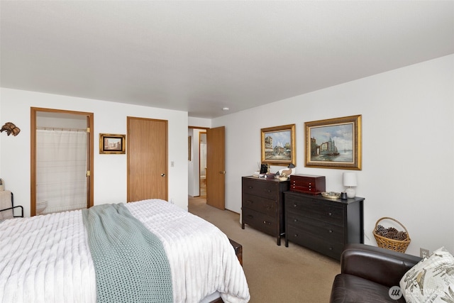9695 Spinnaker Blvd NW, Silverdale, WA 98383 - bedroom featuring light carpet and ensuite bath
