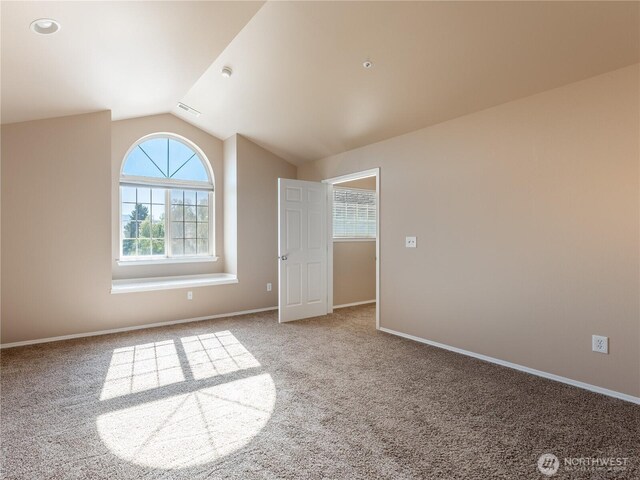 2422 Highland View Dr, East Wenatchee, WA 98802 - unfurnished bedroom with carpet floors, lofted ceiling, and baseboards