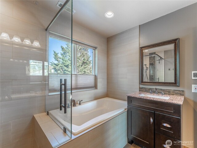 2422 Highland View Dr, East Wenatchee, WA 98802 - bathroom with a bath, vanity, and a stall shower