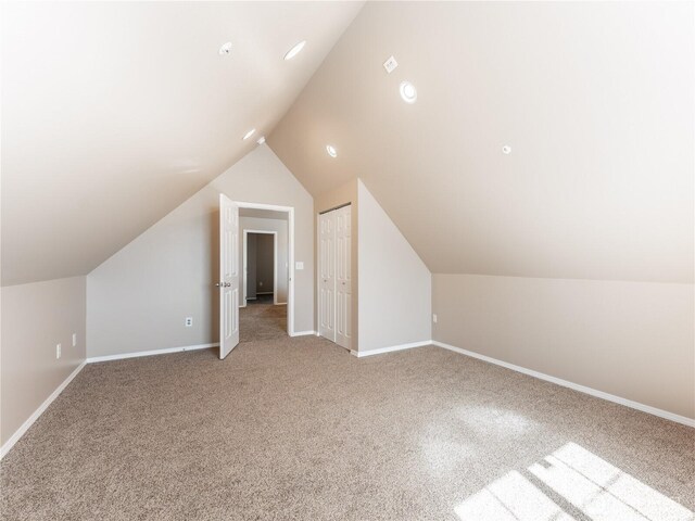 2422 Highland View Dr, East Wenatchee, WA 98802 - bonus room with lofted ceiling, light carpet, and baseboards