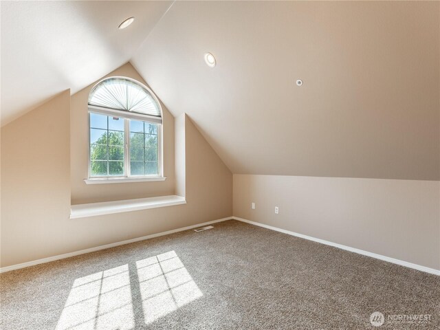 2422 Highland View Dr, East Wenatchee, WA 98802 - bonus room featuring carpet, lofted ceiling, and baseboards