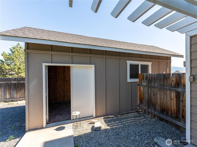 2422 Highland View Dr, East Wenatchee, WA 98802 - view of side of property with board and batten siding and roof with shingles