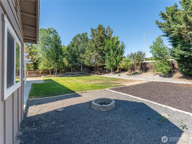 2422 Highland View Dr, East Wenatchee, WA 98802 - view of yard with a fire pit and a patio