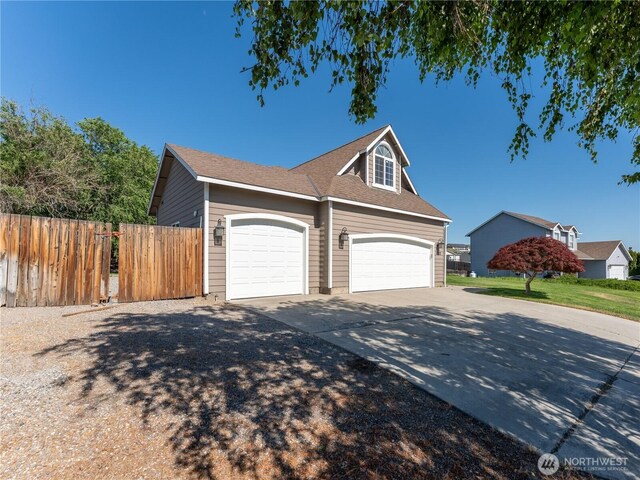 2422 Highland View Dr, East Wenatchee, WA 98802 - view of front of home featuring driveway and a garage