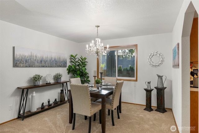 3905 109th Pl SE, Everett, WA 98208 - dining room featuring a chandelier and light carpet