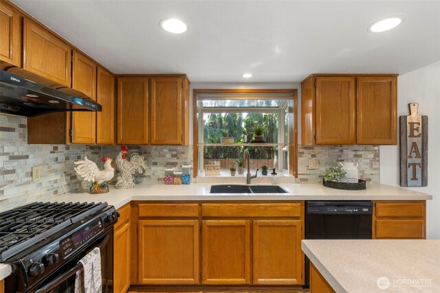 3905 109th Pl SE, Everett, WA 98208 - kitchen featuring black appliances, light countertops, decorative backsplash, extractor fan, and brown cabinets