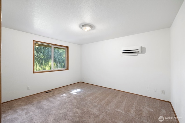 3905 109th Pl SE, Everett, WA 98208 - unfurnished room with a wall mounted air conditioner and carpet