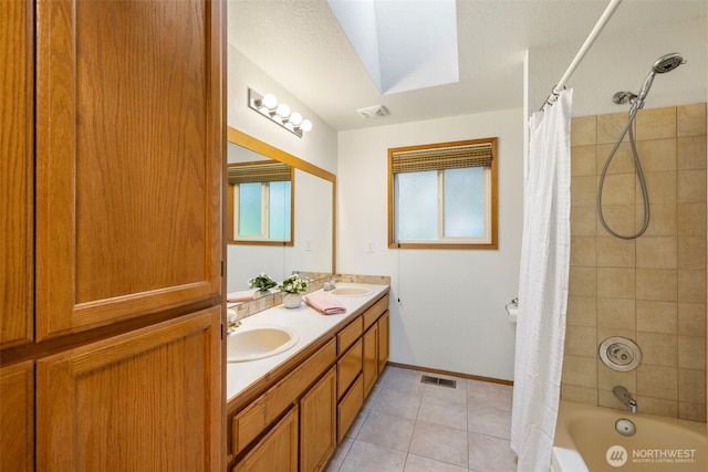 3905 109th Pl SE, Everett, WA 98208 - bathroom with shower / tub combo with curtain, tile patterned floors, double vanity, and a skylight