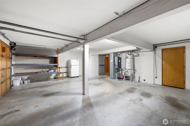 3905 109th Pl SE, Everett, WA 98208 - garage with freestanding refrigerator and water heater
