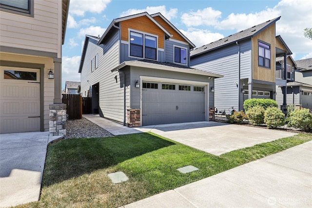 15323 NE 108th Way, Vancouver, WA 98682 - view of front of home with a garage, stone siding, and driveway