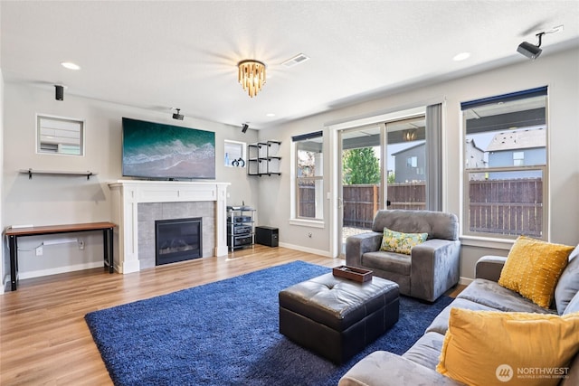 15323 NE 108th Way, Vancouver, WA 98682 - living area with wood finished floors, a fireplace, and recessed lighting