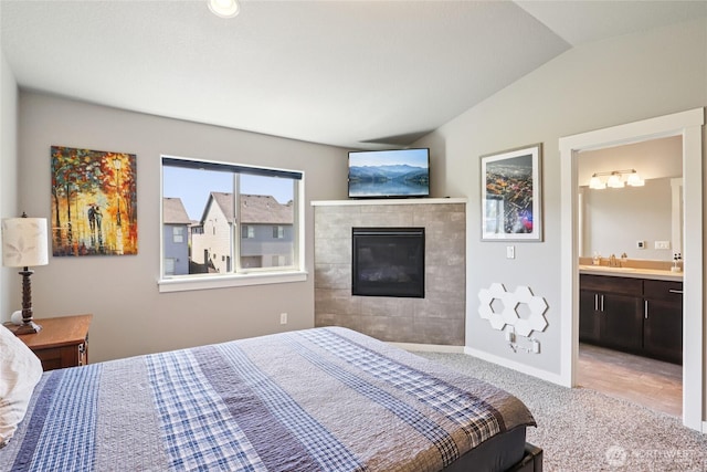 15323 NE 108th Way, Vancouver, WA 98682 - bedroom featuring lofted ceiling, light carpet, a fireplace, and connected bathroom