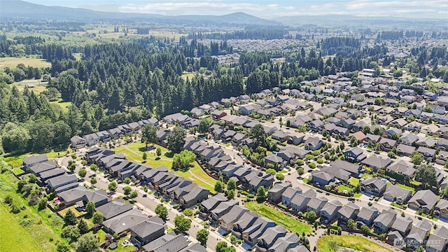 15323 NE 108th Way, Vancouver, WA 98682 - aerial perspective of suburban area featuring mountains and a heavily wooded area