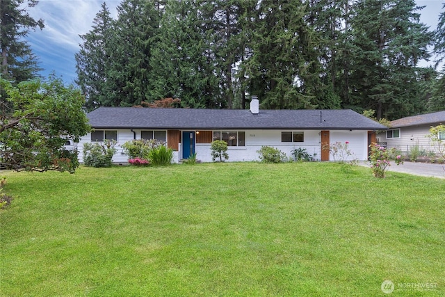 7713 NE 141st St, Kirkland, WA 98034 - ranch-style house featuring driveway, a chimney, an attached garage, and a front yard