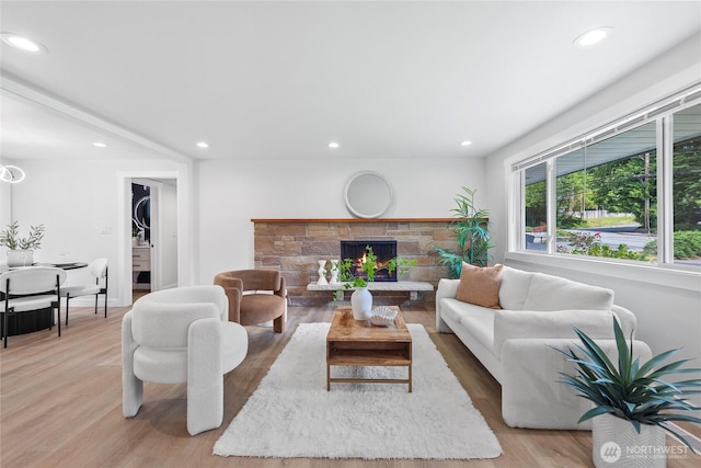 7713 NE 141st St, Kirkland, WA 98034 - living area featuring recessed lighting, light wood finished floors, and a stone fireplace