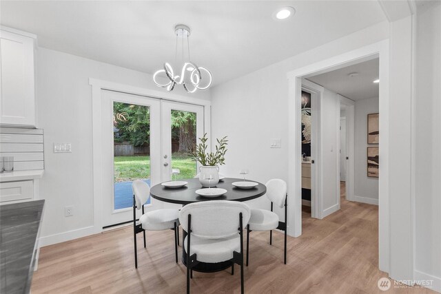 7713 NE 141st St, Kirkland, WA 98034 - dining area with light wood-style flooring, a chandelier, and recessed lighting