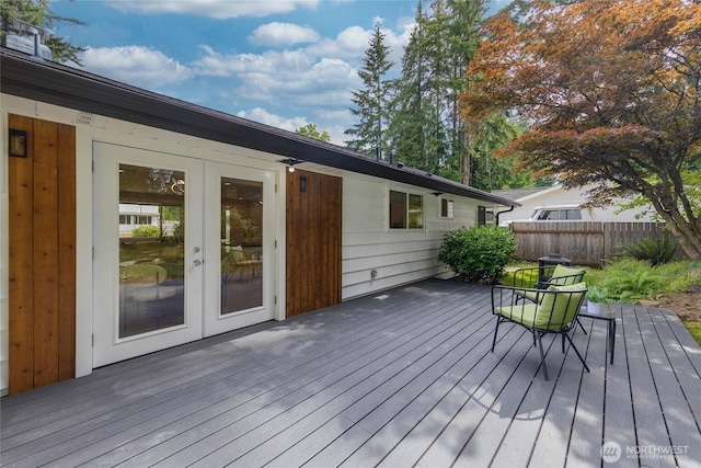 7713 NE 141st St, Kirkland, WA 98034 - wooden terrace with french doors