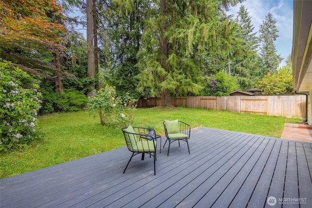 7713 NE 141st St, Kirkland, WA 98034 - wooden deck featuring a fenced backyard