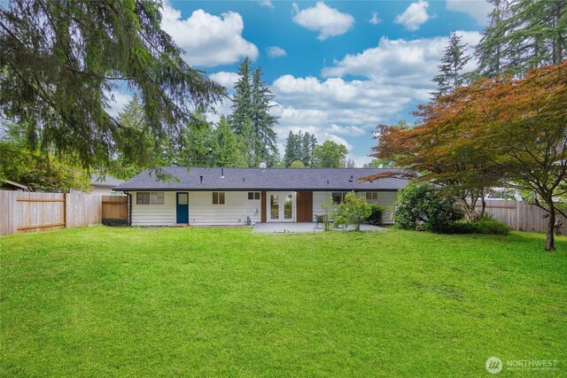 7713 NE 141st St, Kirkland, WA 98034 - rear view of property featuring french doors, a fenced backyard, and a patio