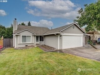 2518 NE 82nd Way, Vancouver, WA 98665 - ranch-style home with a garage, driveway, and a chimney