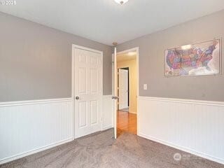 2518 NE 82nd Way, Vancouver, WA 98665 - carpeted empty room with a wainscoted wall