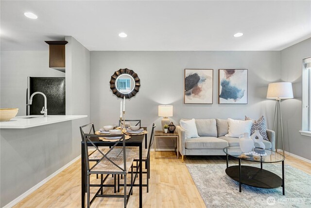 3446A 34th Ave W, Seattle, WA 98199 - living area with light wood-style flooring and recessed lighting