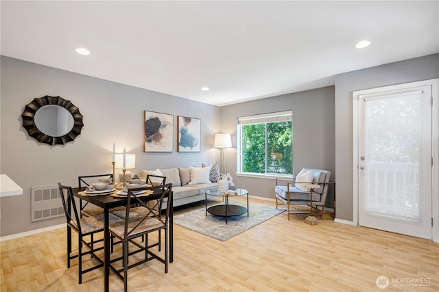3446A 34th Ave W, Seattle, WA 98199 - living area featuring light wood-style floors, recessed lighting, and radiator
