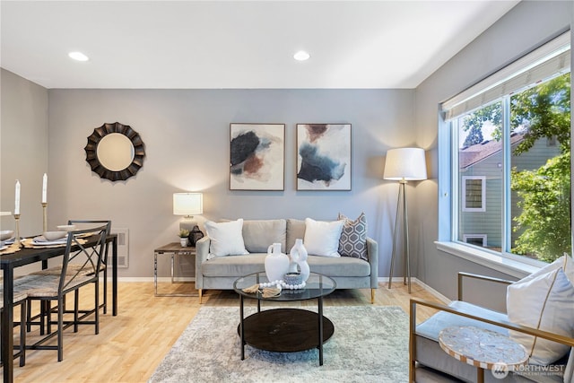 3446A 34th Ave W, Seattle, WA 98199 - living room featuring light wood-style flooring and recessed lighting