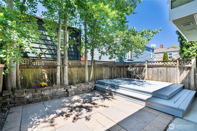 3446A 34th Ave W, Seattle, WA 98199 - fenced backyard with a patio area and a deck