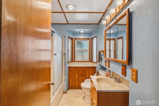1300 Monitor Ave, Wenatchee, WA 98801 - full bathroom featuring toilet, vanity, tile patterned flooring, and a textured wall