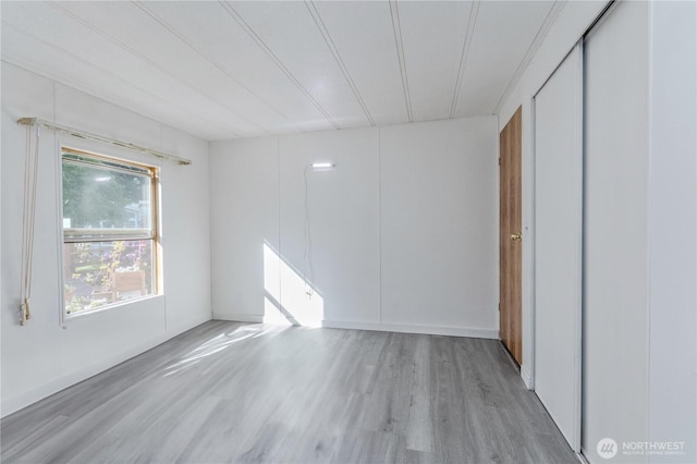 24443 Wicker Rd Unit 16, Sedro Woolley, WA 98284 - unfurnished bedroom featuring wood finished floors
