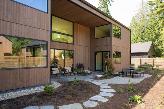 580 Park Ave NE, Bainbridge Island, WA 98110 - rear view of house featuring a patio area