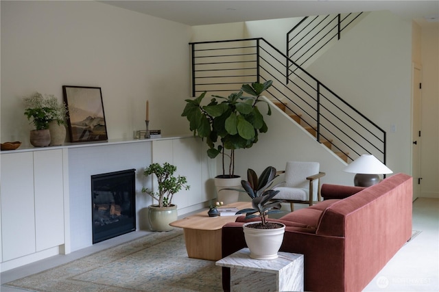 580 Park Ave NE, Bainbridge Island, WA 98110 - living room featuring a glass covered fireplace and stairs