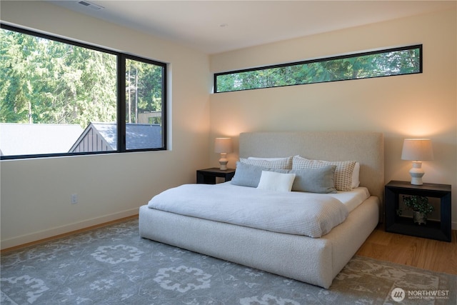 580 Park Ave NE, Bainbridge Island, WA 98110 - bedroom with wood finished floors and baseboards