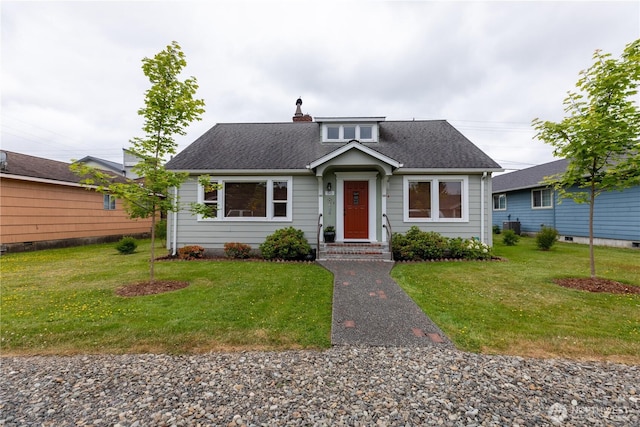 50 Blackberry St, Forks, WA 98331 - bungalow-style home featuring a chimney, a front yard, and roof with shingles